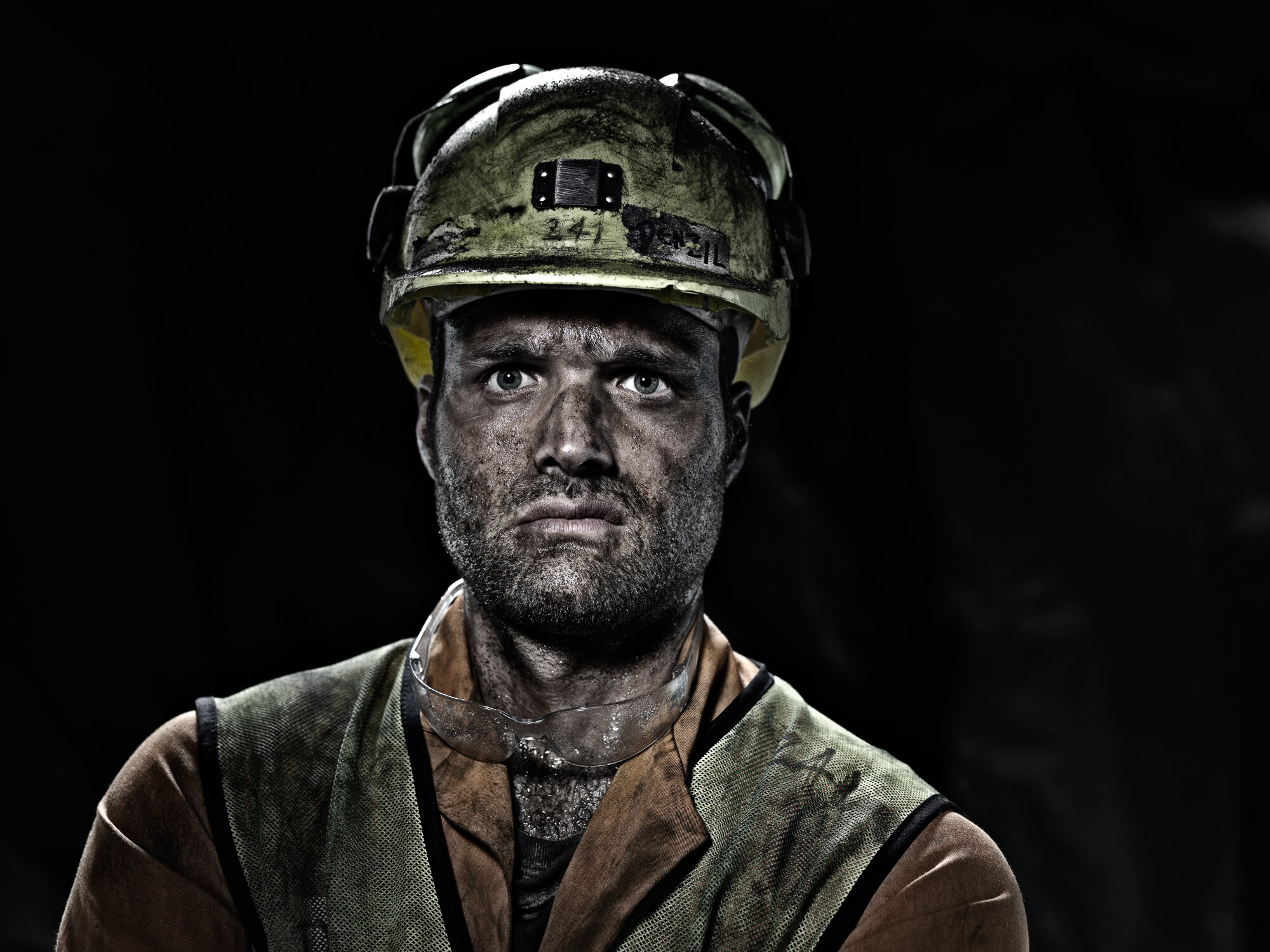 A miner covered in dirt